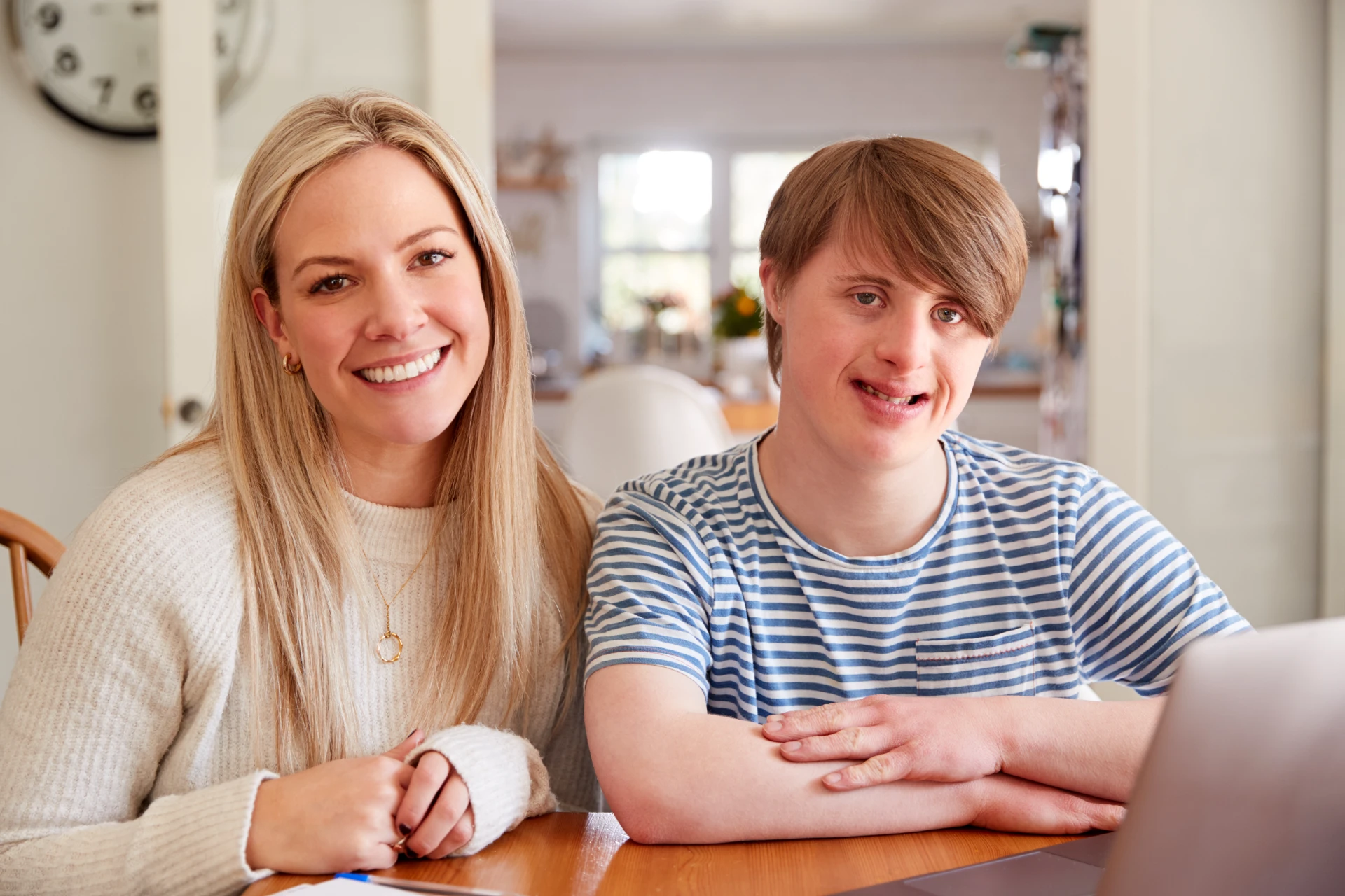 portrait of downs syndrome man sitting with home t 2021 08 26 16 15 27 utc